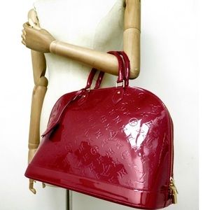 Louis Vuitton Authentic Alma Monogram Purse